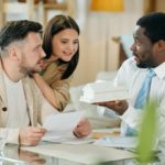 Young couple with mortgage consultant